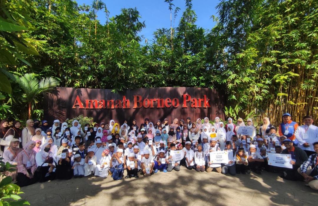 Orphans and underprivileged children enjoying a day out at Amanah Borneo Park.