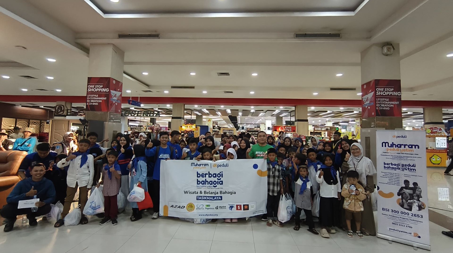 Children shopping for school supplies and snacks at Plaza Asia, Tasikmalaya.
